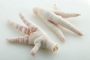 Scalded skinless chicken paws
